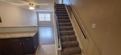 Stairway with tile patterned floors, ornamental mo