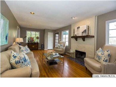 Living room with woodburn fireplace