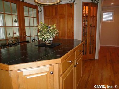 Kitchen LARGE CENTER ISLAND AND A LIQUOR CABINET T