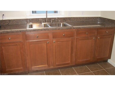 Gorgeous Granite Counter tops in this lovely updat