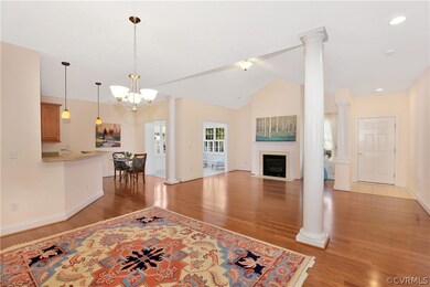 The dining room is open to the family room and kit