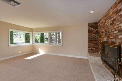 Living room with beautiful brick fire place