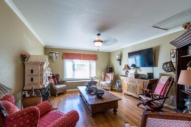Formal Living Room overlooks Backyard & has a 