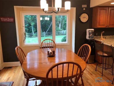 SPACIOUS DINING AREA. NEW WINDOWS THROUGHOUT.