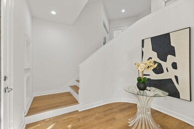 Step inside the foyer on the second level and immediately see beautiful architectural designs.