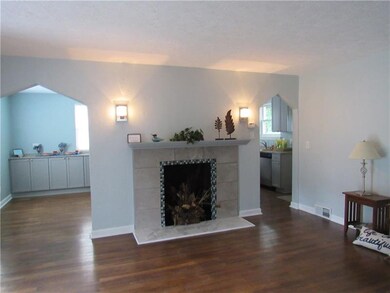 Entry on both sides of the dining room and kitchen