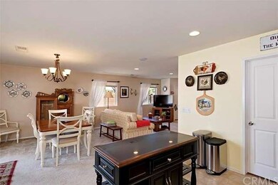 View of Dining room from kitchen (note door to pan