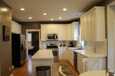 Kitchen With Long Island & Stainless Ste