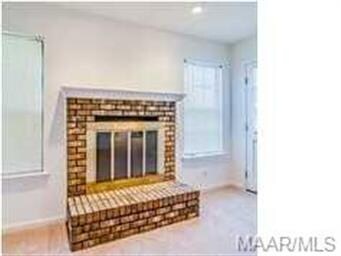 This townhouse has a working fireplace. Won't be l