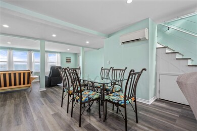 Dining /area with second living area in background