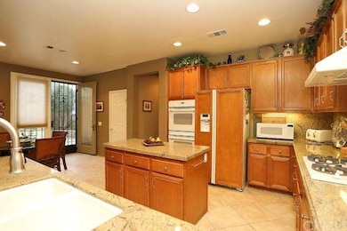 Kitchen with Island and Granite Counter Tops
