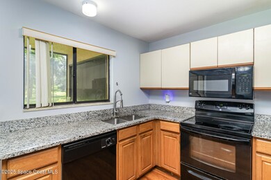 7817 Maplewood Dr unit 601, Melbourne, FL 32904 - photo 6