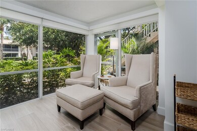 Sunroom / solarium with outdoor dining area
