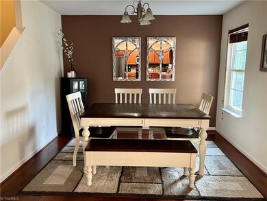 Dining area adjoins kitchen openly