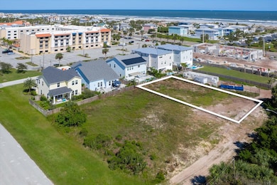 Aerial view of property's location with a nearby body of water and property boundaries highlighted