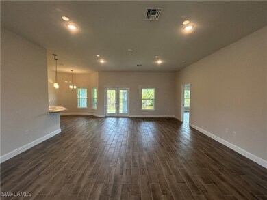 Family room featuring plenty of natural light, dar