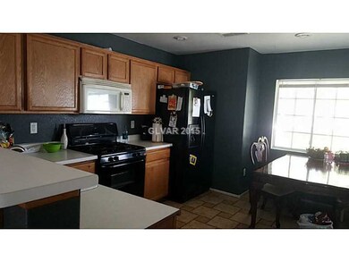 Kitchen. BREAKFAST BAR ...FRIDGE INCLUDED!!