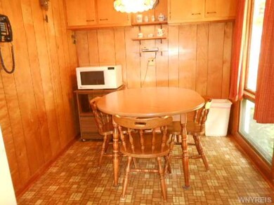 Kitchen Eating area with window to fully fenced ya