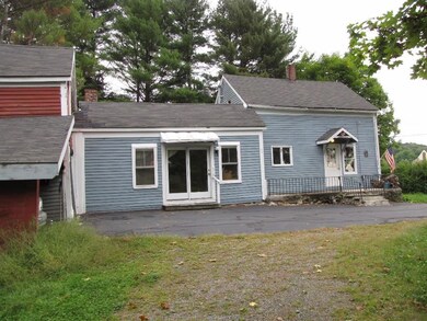 West side of home taken from gravel...