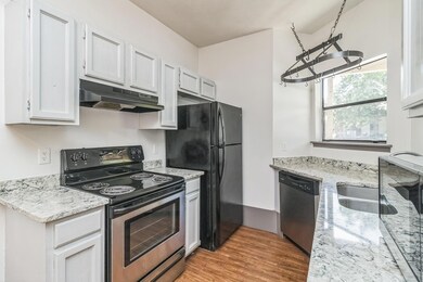 Kitchen featuring appliances with stainless steel