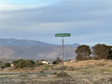 View of mountain background featuring rural landscape