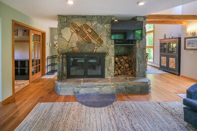Stone fireplace with wood storage