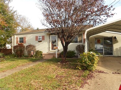 Another view of home and carport area.