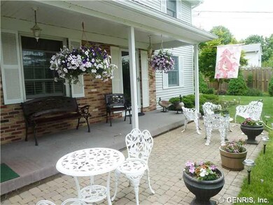 Exterior Front. Covered front porch and extended p