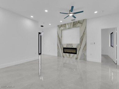 Unfurnished living room with recessed lighting, ce