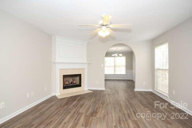 Great room with gas log fireplace new vinyl plank floors 