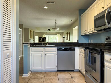 Kitchen featuring appliances with stainless steel 