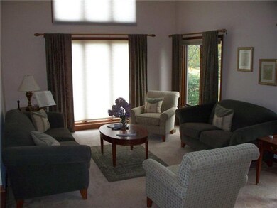Living Room. The living room has a vaulted ceiling