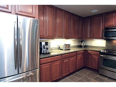 Kitchen. Gorgeous granite and stainless steel comp