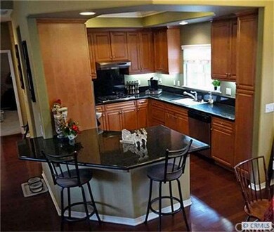 Kitchen with counter bar.