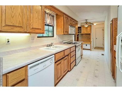 Kitchen. Large Galley style Kitchen has tons of counter space & a pantry.