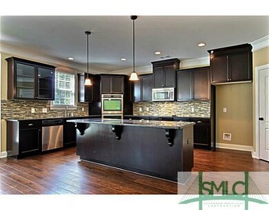 Kitchen. This gorgeous kitchen features custom-fit