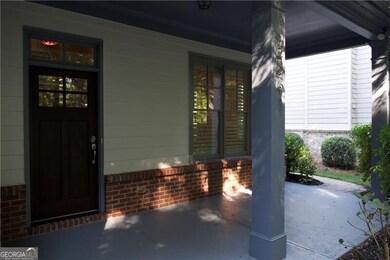 A rocking chair front porch greets you and your guest.