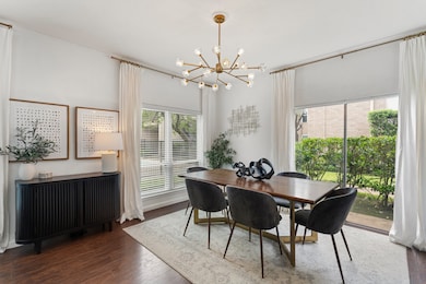 The dining room is bright and inviting, featuring