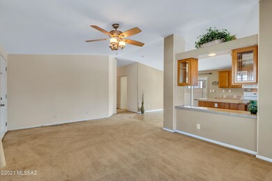 Living Room Facing Kitchen and Dining Ar