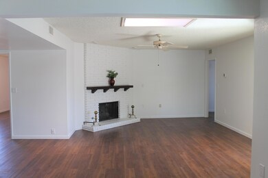 Famly Room with Fireplace and Skylight