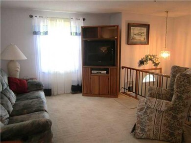 Living Room Berber carpeted 15 x 11 Living room w/