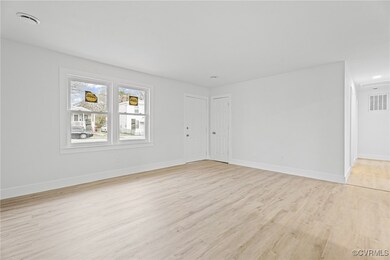 Unfurnished room with light wood finished floors,
