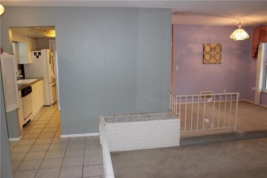 LOOKING TOWARDS FRONT FOYER AND KITCHEN