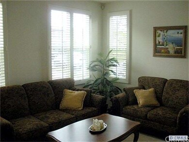 Formal living room with shutters
