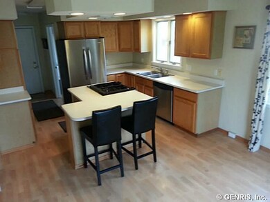 Kitchen. Breakfast Island for extra eating room. L