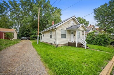 Bungalow-style home featuring a porch and a front 