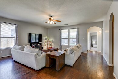 This living room is full of natural light and wood