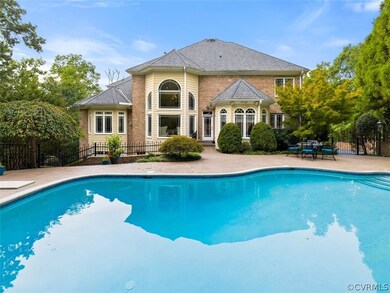 Rear of home showing inground gunite pool. Super p