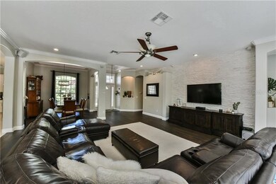 Family room off kitchen with  hardwood floors and 