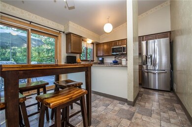 Eat-in kitchen with new sliding patio door leading